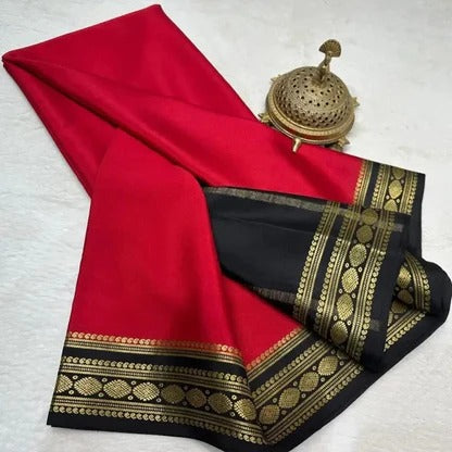 Celebrity-Inspired Red Silk Saree with Black & Gold Temple Border (Rashmika Wedding Style)
