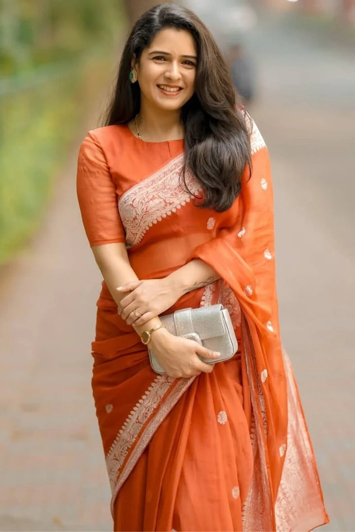 Nemesis Orange Linen Silk Saree With Delectable Blouse Piece