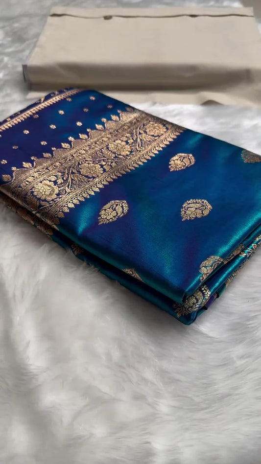 BLUE SATIN SILK SAREE WITH RICH GOLDEN ZARI BORDER AND FLORAL MOTIFS