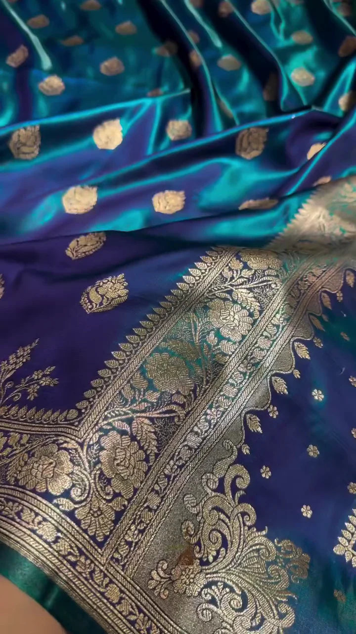 BLUE SATIN SILK SAREE WITH RICH GOLDEN ZARI BORDER AND FLORAL MOTIFS