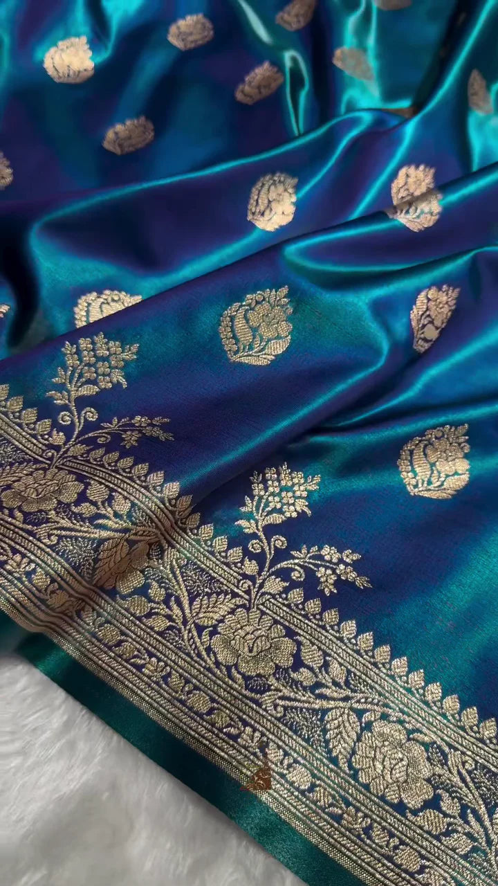 BLUE SATIN SILK SAREE WITH RICH GOLDEN ZARI BORDER AND FLORAL MOTIFS